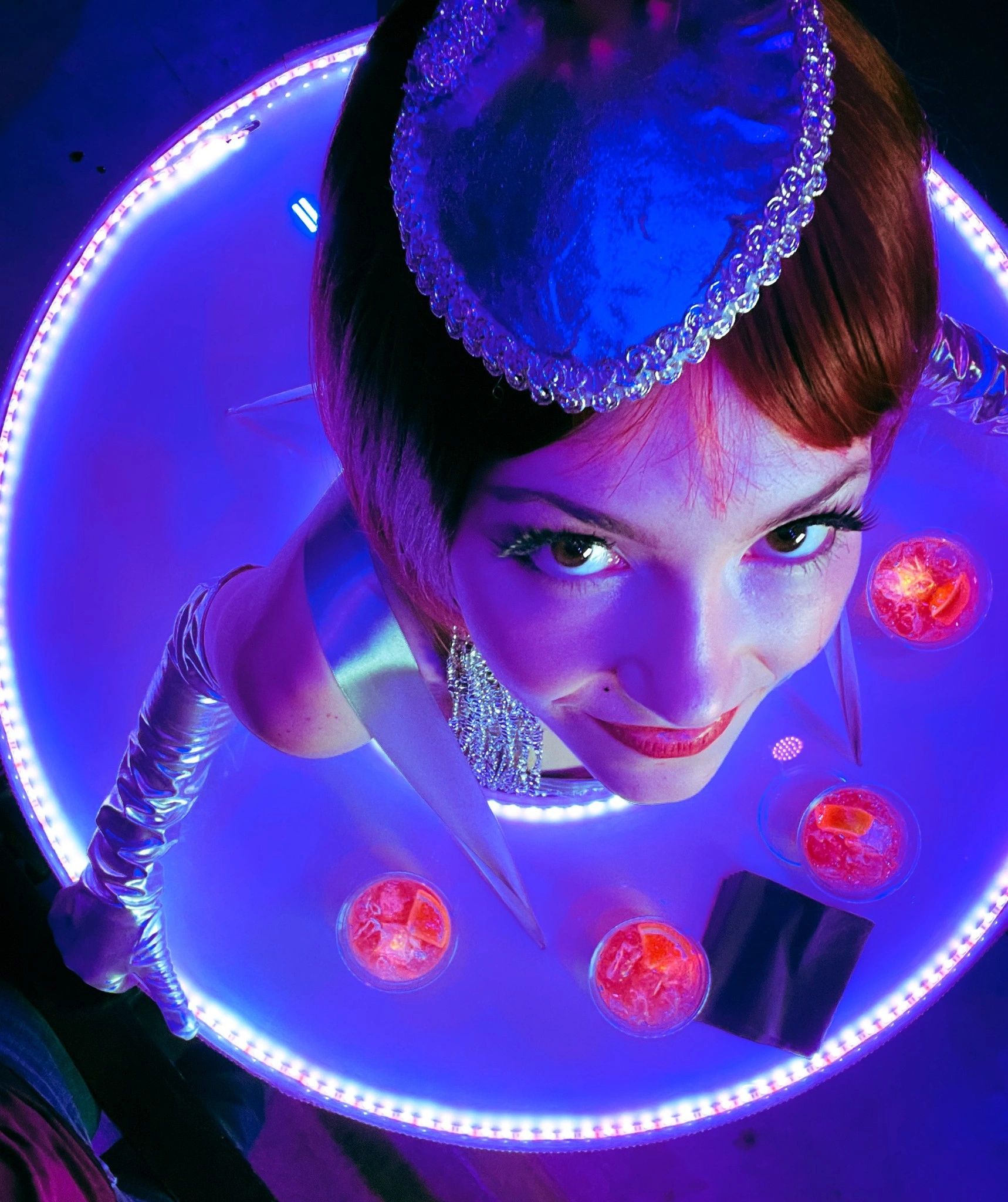 Model in futuristic LED costume with neon lighting